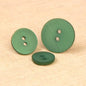 Bouton 2 TROUS irisé 18mm 540 vert sapin