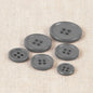 Bouton Classique 4 trous 11 mm 579 gris fonc�